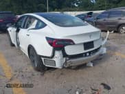 ✅ 2021 Tesla Model 3 Standard Range Plus • VIN: 5YJ3E1EA0MF018267 • Lot: 43075090. Listed on IAAI with Not provided. Free auction sales archive from the USA and detailed vehicle history report at DreamBid. Image 3.