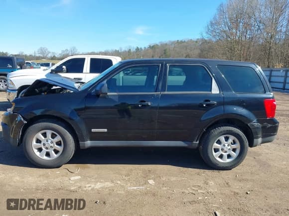 ✅ 2008 Mazda Tribute Sport • VIN: 4F2CZ02Z68KM31828 • Lot: 41622840. Listed on IAAI with 209,473 mi. Free auction sales archive from the USA and detailed vehicle history report at DreamBid. Image 14.