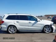 ✅ 2013 Mercedes-Benz GL 550 • VIN: 4JGDF7DE8DA239936 • Lot: 42703205. Listed on IAAI with 149,286 mi. Free auction sales archive from the USA and detailed vehicle history report at DreamBid. Image 13.