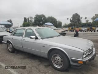 ✅ 1989 Jaguar XJ • VIN: SAJHY1546KC562355 • Лот: 59936955. Опубликован ранее на Copart с пробегом 78 744 миль. Бесплатный доступ к архиву аукционных продаж из США и подробный отчёт об истории автомобиля на DreamBid. Изображение 4.