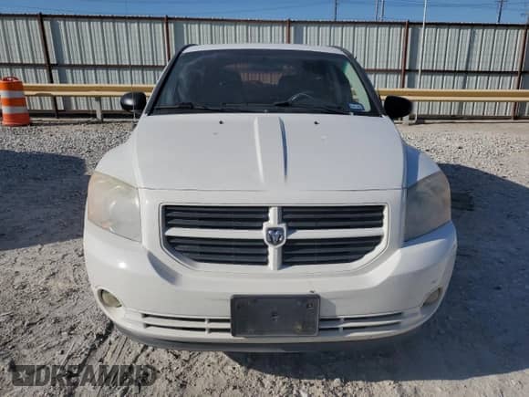 2008 Dodge Caliber SXT с VIN 1B3HB48B18D679860, выставлен на аукционе Copart как лот 71800004 с пробегом 165 882 миль миль и Списание • Salvage title. История ставок и продаж доступна на DreamBid. Изображение 5.