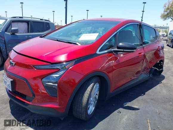 ✅ 2022 Chevrolet Bolt EV 1LT • VIN: 1G1FW6S04N4122457 • Lot: 42525826. Listed on IAAI with 25,303 mi. Free auction sales archive from the USA and detailed vehicle history report at DreamBid. Image 2.