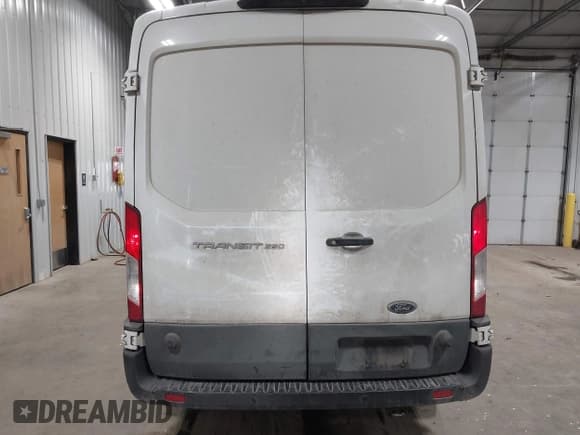 ✅ 2020 Ford Transit Cargo • VIN: 1FTBR1C88LKB56656 • Lot: 43633253. Listed on IAAI with 121,968 mi. Free auction sales archive from the USA and detailed vehicle history report at DreamBid. Image 16.