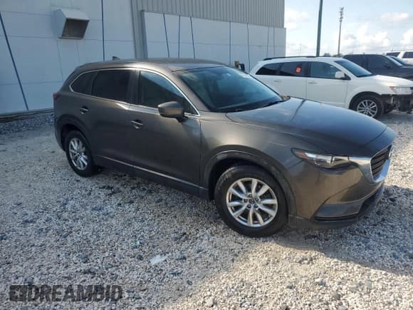 ✅ 2016 Mazda CX-9 Sport • VIN: JM3TCBBY8G0111223 • Lot: 67544395. Listed on Copart with 107,034 mi. Free auction sales archive from the USA and detailed vehicle history report at DreamBid. Image 4.