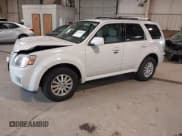 ✅ 2010 Mercury Mariner Premier • VIN: 4M2CN8HGXAKJ00279 • Lot: 41748487. Listed on IAAI with 116,565 mi. Free auction sales archive from the USA and detailed vehicle history report at DreamBid. Image 17.