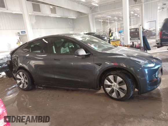 ✅ 2023 Tesla Model Y Long Range • VIN: 7SAYGDEE5PA033341 • Lot: 41379625. Listed on IAAI with Not provided. Free auction sales archive from the USA and detailed vehicle history report at DreamBid. Image 13.
