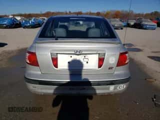 2005 Hyundai Elantra GLS z VIN KMHDN56D55U136582, wystawiony jako Copart lot #79481364 z przebiegiem 180 298 mil mil oraz Szkoda całkowita • Salvage title. Historia ofert i sprzedaży dostępna na DreamBid. Obrazek 6.