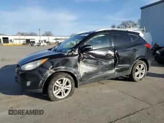 2013 Hyundai Tucson GLS with VIN KM8JU3AC8DU714035, listed as a Copart auction lot 44405174 with 230,971 mi miles and Salvage title. Bid and sale history available at DreamBid. Image 1.