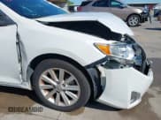 ✅ 2014 Toyota Camry SE • VIN: 4T1BK1FK3EU550936 • Lot: 42458850. Listed on IAAI with 182,073 mi. Free auction sales archive from the USA and detailed vehicle history report at DreamBid. Image 19.