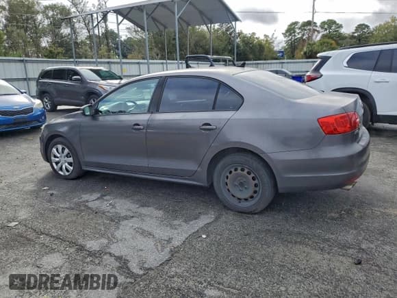 ✅ 2014 Volkswagen Jetta SE • VIN: 3VWD17AJ6EM278840 • Lot: 94990005. Listed on Copart with 198,476 mi. Free auction sales archive from the USA and detailed vehicle history report at DreamBid. Image 2.