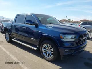 ✅ 2022 Ram 1500 Laramie • VIN: 1C6RREJTXNN291496 • Lot: 43663207. Listed on IAAI with 51,775 mi. Free auction sales archive from the USA and detailed vehicle history report at DreamBid. Image 1.