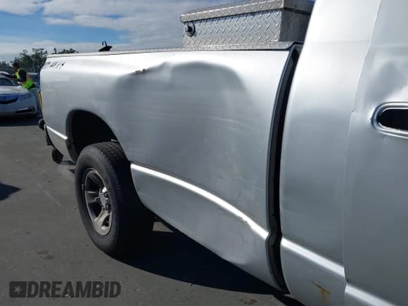 ✅ 2004 Dodge 1500 SLT • VIN: 1D7HA16D64J114283 • Lot: 43898315. Listed on IAAI with 264,477 mi. Free auction sales archive from the USA and detailed vehicle history report at DreamBid. Image 6.