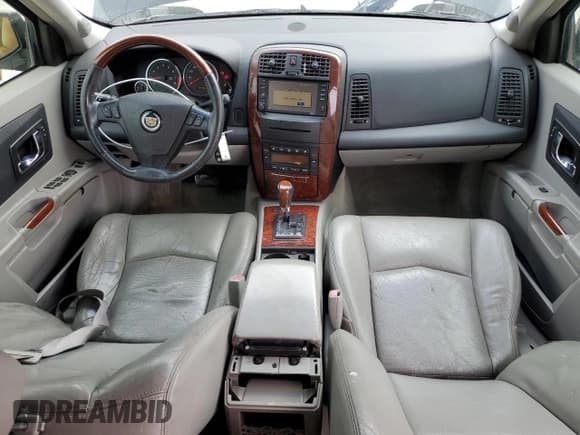 ✅ 2006 Cadillac SRX • VIN: 1GYEE63A760144999 • Лот: 87649445. Опубликован ранее на Copart с пробегом 85 765 миль. Бесплатный доступ к архиву аукционных продаж из США и подробный отчёт об истории автомобиля на DreamBid. Изображение 8.