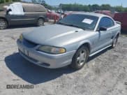 ✅ 1995 Ford Mustang • VIN: 1FALP4047SF170414 • Lot: 42079990. Listed on IAAI with 106,398 mi. Free auction sales archive from the USA and detailed vehicle history report at DreamBid. Image 2.