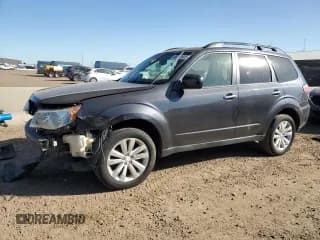 ✅ 2012 Subaru Forester X Premium • VIN: JF2SHADC7CG400825 • Lot: 82203925. Listed on Copart with 147,544 mi. Free auction sales archive from the USA and detailed vehicle history report at DreamBid. Image 1.