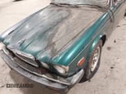 ✅ 1985 Jaguar XJ • VIN: SAJAV1347FC414864 • Lot: 42118511. Listed on IAAI with 117,185 mi. Free auction sales archive from the USA and detailed vehicle history report at DreamBid. Image 6.