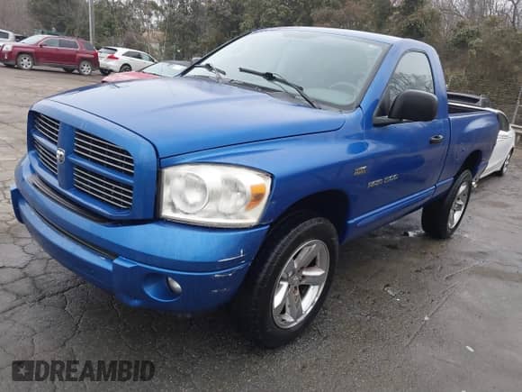 2007 Dodge 1500 SLT with VIN 1D7HU16297J514784, listed as a IAAI auction lot 41785504 with 100,092 mi miles and . Bid and sale history available at DreamBid. Image 2.