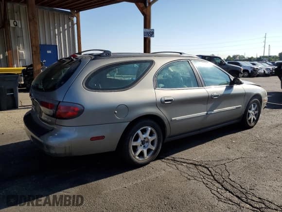 ✅ 2002 Mercury Sable GS • VIN: 1MEFM58U22A611100 • Lot: 68543485. Listed on Copart with 137,792 mi. Free auction sales archive from the USA and detailed vehicle history report at DreamBid. Image 3.