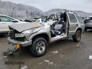 2003 Chevrolet Blazer LS z VIN 1GNCS13X63K129026, wystawiony jako Copart lot #84567954 z przebiegiem Nie podano mil oraz Szkoda całkowita • Salvage title. Historia ofert i sprzedaży dostępna na DreamBid. Obrazek 1.