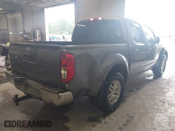✅ 2018 Nissan Frontier SV • VIN: 1N6AD0EV7JN763356 • Lot: 43017834. Listed on IAAI with 96,927 mi. Free auction sales archive from the USA and detailed vehicle history report at DreamBid. Image 4.