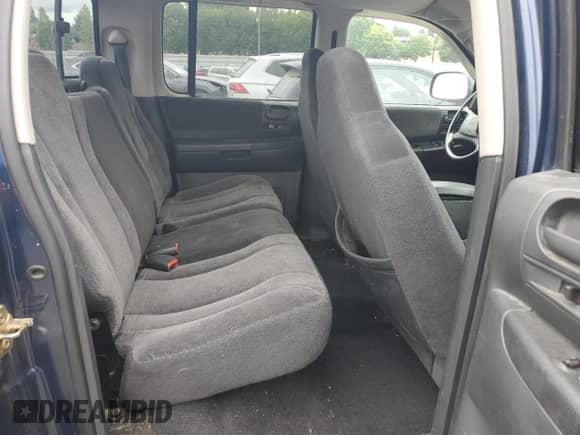 2004 Dodge Dakota SLT z VIN 1D7HG48N94S688652, wystawiony jako Copart lot #71942564 z przebiegiem 141 942 mil mil oraz Szkoda całkowita • Salvage title. Historia ofert i sprzedaży dostępna na DreamBid. Obrazek 10.