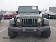✅ 2007 Jeep Wrangler Unlimited Sahara • VIN: 1J4GA59147L218594 • Lot: 42984397. Listed on IAAI with 108,296 mi. Free auction sales archive from the USA and detailed vehicle history report at DreamBid. Image 13.