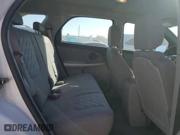 2007 Chevrolet Equinox LS z VIN 2CNDL13F976247044, wystawiony jako Copart lot #76099004 z przebiegiem 92 888 mil mil oraz Szkoda całkowita • Salvage title. Historia ofert i sprzedaży dostępna na DreamBid. Obrazek 12.