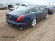 ✅ 2015 Jaguar XJ Portfolio • VIN: SAJWA2GZ7F8V90474 • Lot: 42449952. Listed on IAAI with 48,487 mi. Free auction sales archive from the USA and detailed vehicle history report at DreamBid. Image 4.