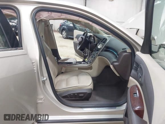 ✅ 2013 Chevrolet Malibu LTZ • VIN: 1G11H5SA5DF179700 • Lot: 43591171. Listed on IAAI with 148,979 mi. Free auction sales archive from the USA and detailed vehicle history report at DreamBid. Image 4.