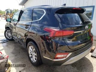 ✅ 2019 Hyundai Santa Fe SEL • VIN: 5NMS3CAD0KH009464 • Lot: 61219624. Wystawiony na Copart z przebiegiem 83 171 mil. Bezpłatny archiwum sprzedaży aukcyjnych z USA i szczegółowy raport historii pojazdu na DreamBid. Zdjęcie 2.