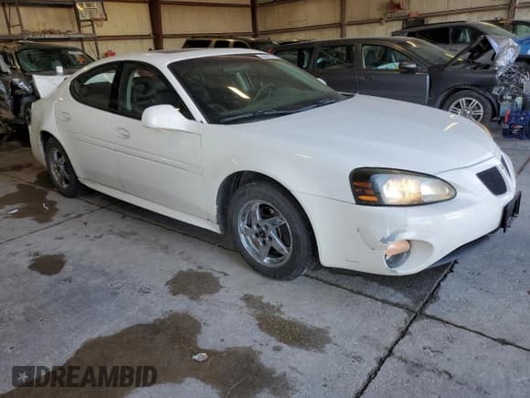 ✅ 2004 Pontiac Grand Prix GT2 • VIN: 2G2WS522741119985 • Lot: 86893245. Listed on Copart with 216,080 mi. Free auction sales archive from the USA and detailed vehicle history report at DreamBid. Image 4.