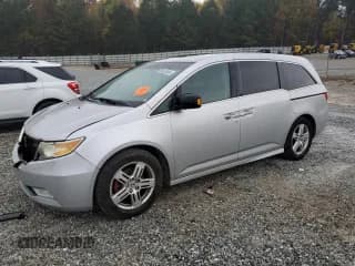 ✅ 2011 Honda Odyssey Touring • VIN: 5FNRL5H96BB017470 • Lot: 80616404. Listed on Copart with 200,451 mi. Free auction sales archive from the USA and detailed vehicle history report at DreamBid. Image 1.