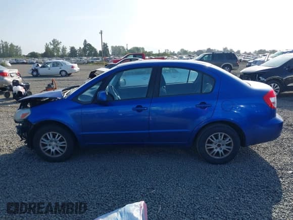 ✅ 2013 Suzuki SX4 LE • VIN: JS2YC5A36D6101505 • Lot: 42485012. Wystawiony na IAAI z przebiegiem 123 922 mil. Bezpłatny archiwum sprzedaży aukcyjnych z USA i szczegółowy raport historii pojazdu na DreamBid. Zdjęcie 15.