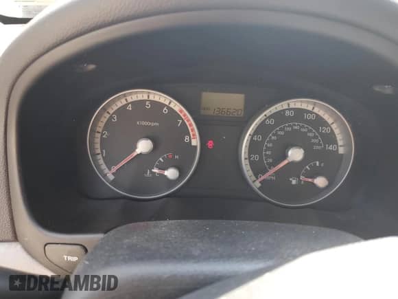 2008 Hyundai Accent GLS with VIN KMHCN46CX8U276130, listed as a Copart auction lot 70699884 with 136,620 mi miles and Salvage title. Bid and sale history available at DreamBid. Image 9.