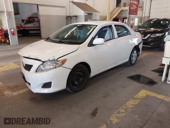 ✅ 2010 Toyota Corolla • VIN: 1NXBU4EE5AZ284210 • Lot: 42334607. Listed on IAAI with 105,246 mi. Free auction sales archive from the USA and detailed vehicle history report at DreamBid. Image 2.