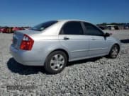 ✅ 2006 Kia Spectra EX • VIN: KNAFE122165315723 • Lot: 90743305. Wystawiony na Copart z przebiegiem 121 518 mil. Bezpłatny archiwum sprzedaży aukcyjnych z USA i szczegółowy raport historii pojazdu na DreamBid. Zdjęcie 3.