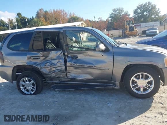 ✅ 2006 GMC Envoy Denali • VIN: 1GKET63M262301515 • Lot: 43653834. Wystawiony na IAAI z przebiegiem 207 815 mil. Bezpłatny archiwum sprzedaży aukcyjnych z USA i szczegółowy raport historii pojazdu na DreamBid. Zdjęcie 13.