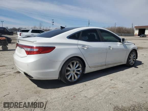 2013 Hyundai Azera с VIN KMHFH4JG4DA251458, выставлен на аукционе Copart как лот 49025725 с пробегом 109 665 миль миль и Списание • Salvage title. История ставок и продаж доступна на DreamBid. Изображение 3.