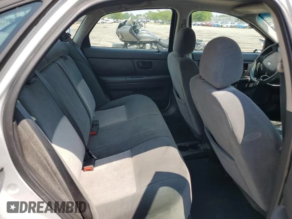 ✅ 2004 Ford Taurus SES • VIN: 1FAHP55S64G148159 • Lot: 68862385. Listed on Copart with 240,782 mi. Free auction sales archive from the USA and detailed vehicle history report at DreamBid. Image 10.