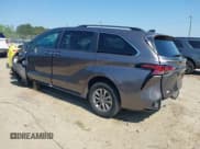 ✅ 2021 Toyota Sienna XLE • VIN: 5TDYRKEC0MS007394 • Lot: 42080004. Listed on IAAI with 75,553 mi. Free auction sales archive from the USA and detailed vehicle history report at DreamBid. Image 3.