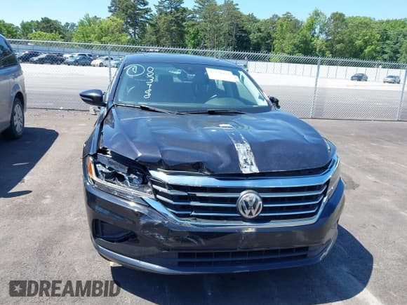 ✅ 2021 Volkswagen Passat SE • VIN: 1VWSA7A30MC003988 • Lot: 42238431. Listed on IAAI with 43,208 mi. Free auction sales archive from the USA and detailed vehicle history report at DreamBid. Image 12.