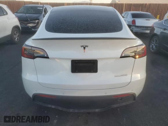 ✅ 2022 Tesla Model Y Performance • VIN: 7SAYGDEF8NF490332 • Lot: 71229425. Listed on Copart with 77,145 mi. Free auction sales archive from the USA and detailed vehicle history report at DreamBid. Image 6.