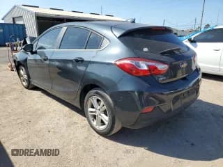 ✅ 2018 Chevrolet Cruze LT • VIN: 3G1BE6SM5JS601680 • Lot: 41832083. Listed on Copart with 82,357 mi. Free auction sales archive from the USA and detailed vehicle history report at DreamBid. Image 2.