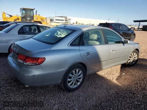 2007 Hyundai Azera SE z VIN KMHFC46F57A205043, wystawiony jako Copart lot #49531885 z przebiegiem 107 272 mil mil oraz Czysty tytuł • Clean title. Historia ofert i sprzedaży dostępna na DreamBid. Obrazek 3.