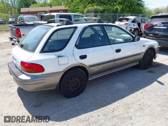 ✅ 1999 Subaru Impreza Outback Special Sports • VIN: JF1GF4857XH811476 • Lot: 42132785. Listed on IAAI with 156,351 mi. Free auction sales archive from the USA and detailed vehicle history report at DreamBid. Image 4.