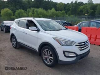 ✅ 2014 Hyundai Santa Fe • VIN: 5XYZU3LA7EG197400 • Лот: 43007590. Опубликован ранее на IAAI с пробегом 157 365 миль. Бесплатный доступ к архиву аукционных продаж из США и подробный отчёт об истории автомобиля на DreamBid. Изображение 1.