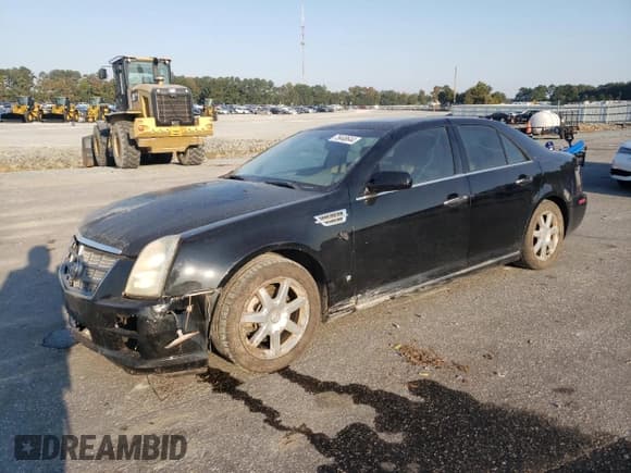 ✅ 2009 Cadillac STS RWD • VIN: 1G6DW67V990108220 • Лот: 75448644. Опубликован ранее на Copart с пробегом 212 439 миль. Бесплатный доступ к архиву аукционных продаж из США и подробный отчёт об истории автомобиля на DreamBid. Изображение 1.