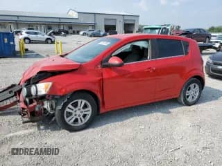 2012 Chevrolet Sonic LT with VIN 1G1JC6SB0C4224176, listed as a Copart auction lot 59357965 with 144,144 mi miles and Salvage title. Bid and sale history available at DreamBid. Image 1.