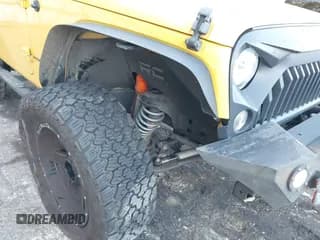 ✅ 2015 Jeep Wrangler Sahara • VIN: 1C4AJWBG0FL737947 • Лот: 43406817. Опубликован ранее на IAAI с пробегом 80 532 миль. Бесплатный доступ к архиву аукционных продаж из США и подробный отчёт об истории автомобиля на DreamBid. Изображение 6.