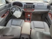 ✅ 2005 Toyota Camry XLE • VIN: 4T1BF30K75U092228 • Лот: 71008545. Опубликован ранее на Copart с пробегом 142 108 миль. Бесплатный доступ к архиву аукционных продаж из США и подробный отчёт об истории автомобиля на DreamBid. Изображение 8.